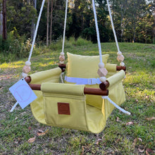Load image into Gallery viewer, Yellow baby swing hanging outdoors