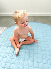 Load image into Gallery viewer, toddler on blue playmat
